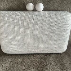 Adorable neutral tight woven clutch/handbag from LOLA NEW YORK